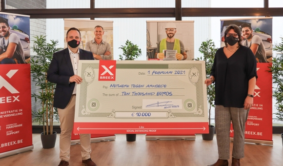 BREEX overhandigt een cheque van 10.000 euro aan het Netwerk tegen Armoede